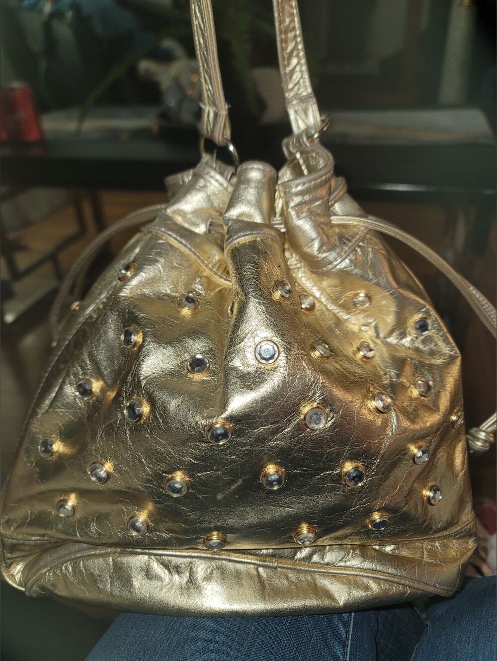 Metallic Gold Studded Drawstring Shoulder Bag